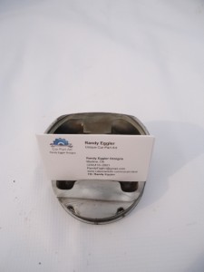 Half piston business card holder